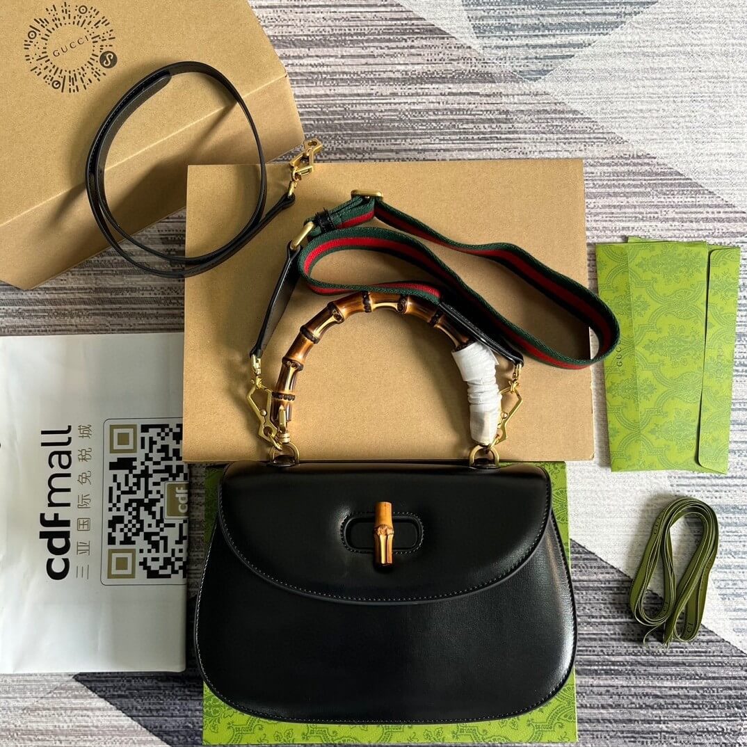 G*u*i bamboo 1947 medium top handle bag