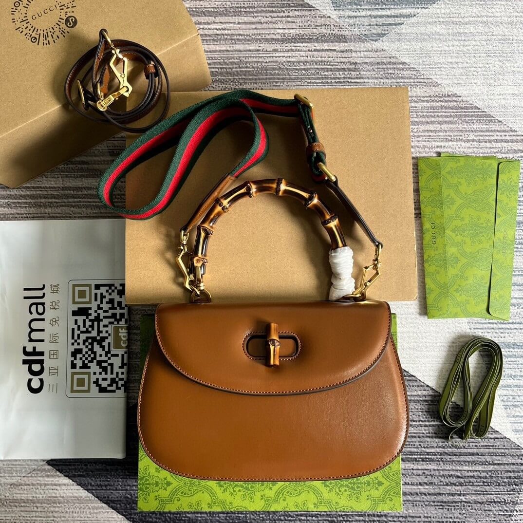G*u*i bamboo 1947 medium top handle bag