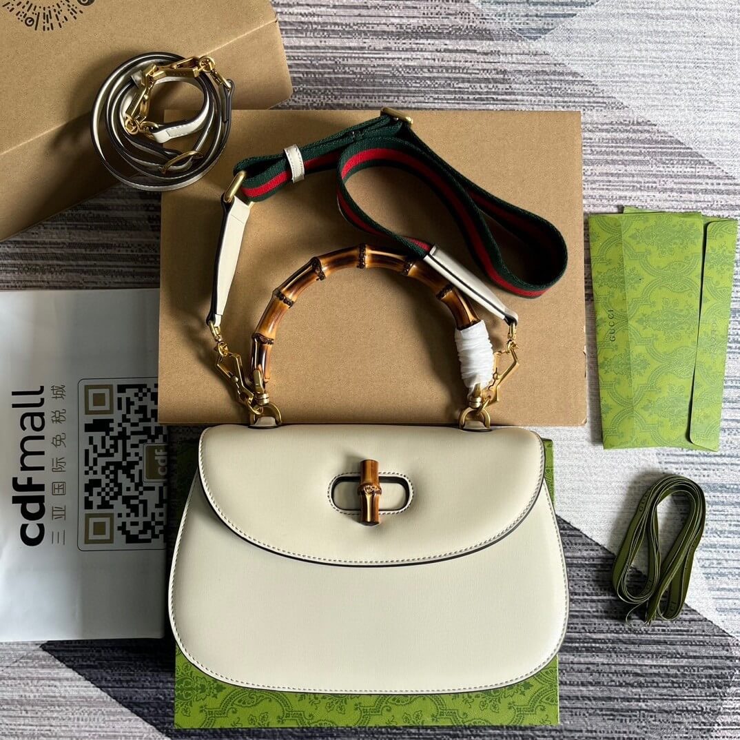 G*u*i bamboo 1947 medium top handle bag