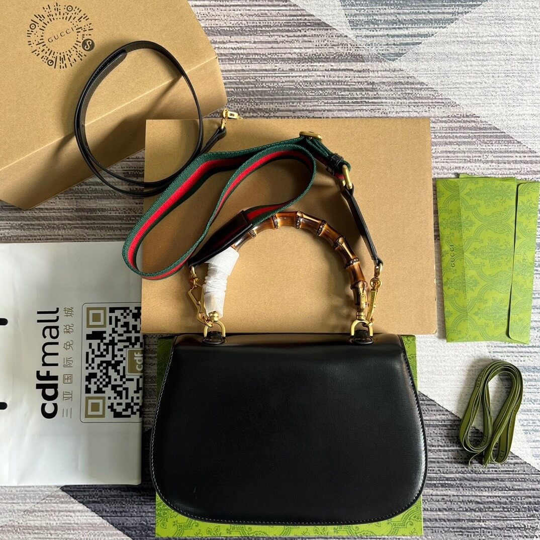 G*u*i bamboo 1947 medium top handle bag