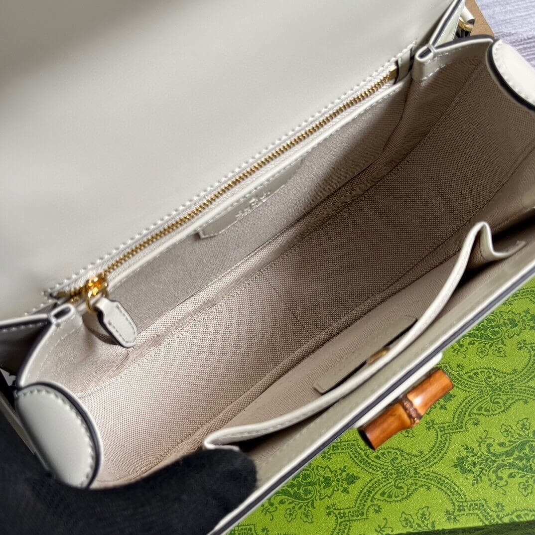 G*u*i bamboo 1947 medium top handle bag