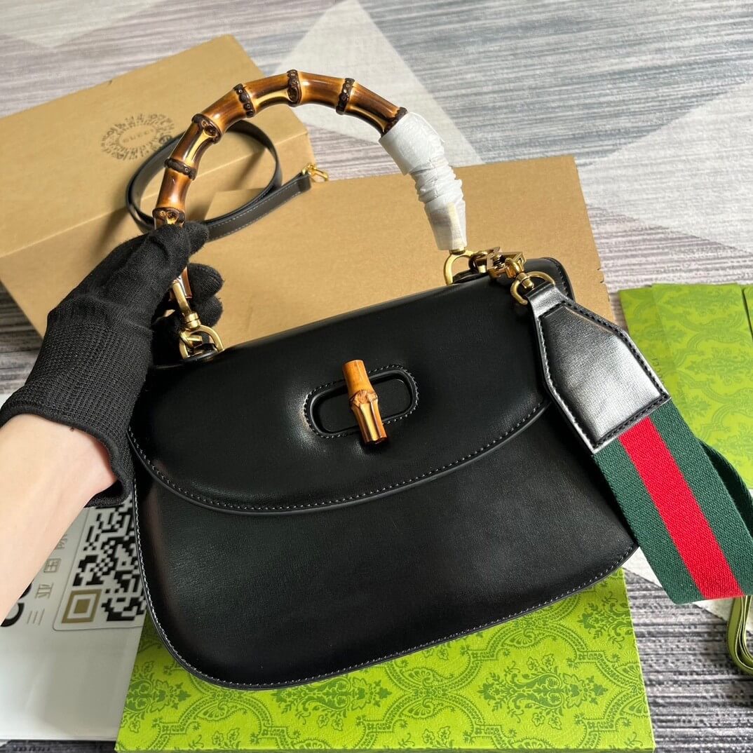 G*u*i bamboo 1947 medium top handle bag