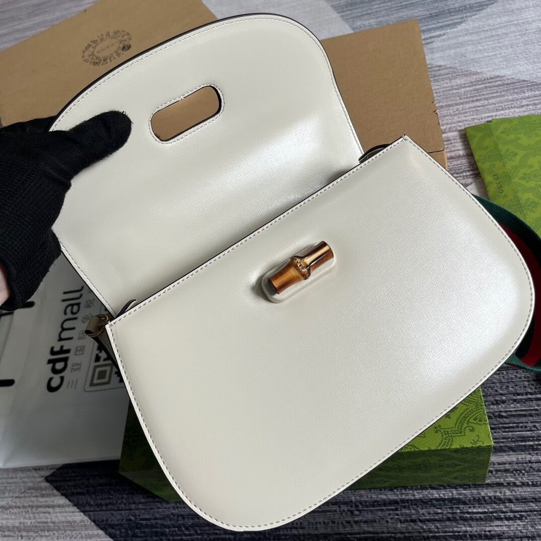 G*u*i bamboo 1947 medium top handle bag